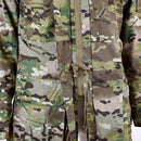 Close-up of original Dutch army M65 field jacket in multitarn camouflage with rip stop fabric and front zipper closure