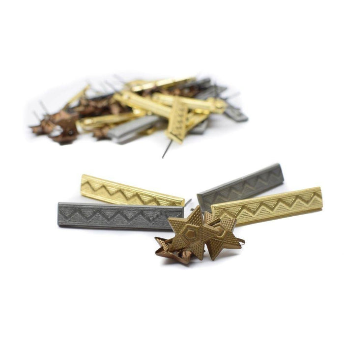 Set of 40 Czech Army military badges including stripes, stars, and rank insignia pins with metal and fabric details.