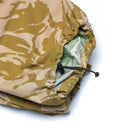 Close-up of genuine British army desert camouflage waterproof Goretex combat trousers with adjustable waist cord