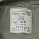 Close-up of label on genuine Czech Army olive green first layer military underwear t-shirt showing size and care instructions