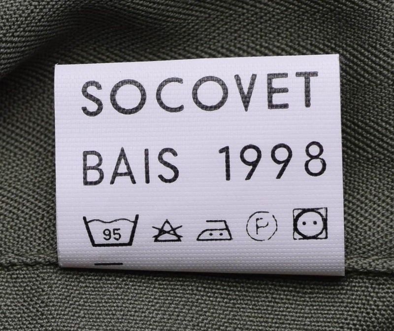 Care label on genuine French army F2 combat jacket showing brand Socovet and washing instructions.
