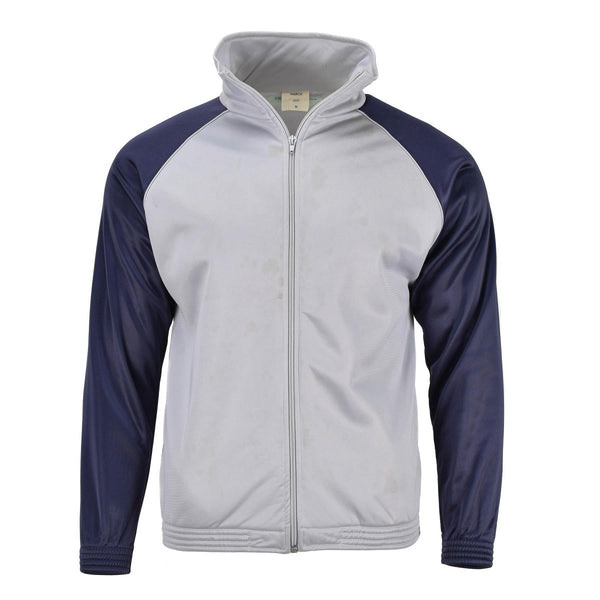 Genuine French Military school track jacket with grey body, navy sleeves, full zip, and elastic cuffs and waistband.