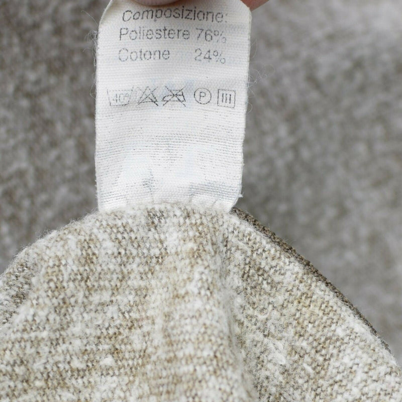 Close-up of fabric tag showing composition of 76% polyester and 24% cotton on vintage Italian army jacket