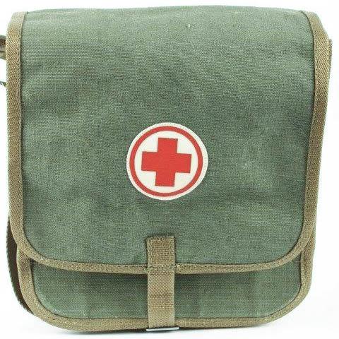 Vintage Polish army medic first aid shoulder bag in heavy-duty canvas with red cross symbol on front flap closure