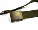 Close-up of German army tactical belt with sturdy brass buckle and heavy-duty olive green webbing strap.