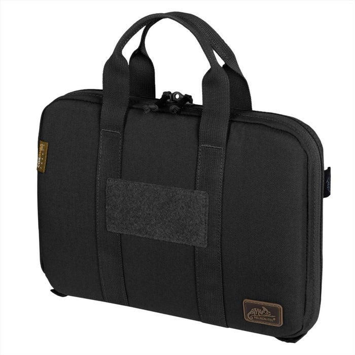 Svart Helikon-Tex Single Pistol Wallet-fodral av Cordura nylon med vadderad insida och dubbla handtag för säker förvaring av vapen