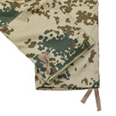Close-up of Leo Kohler Commando tactical field pants in Tropentarn camo with adjustable ankle straps and reinforced stitching