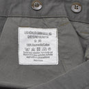 Close-up of Leo Kohler military bermuda shorts cotton label showing size, care instructions, and country of origin.
