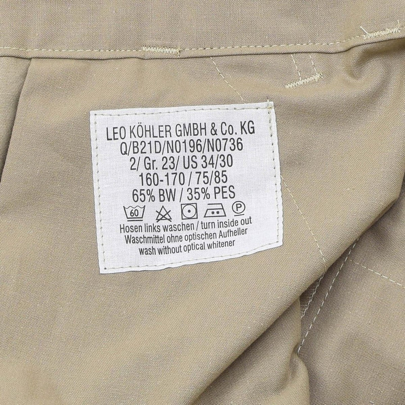 Close-up of Leo Kohler military field pants fabric care label with washing and material details