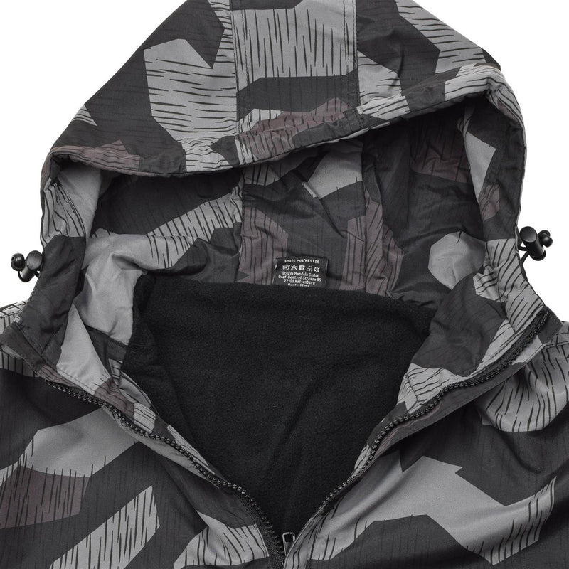 Close-up of MIL-TEC Anorak jacket with splinter night camouflage, hood, and fleece lining for warmth and windproof protection