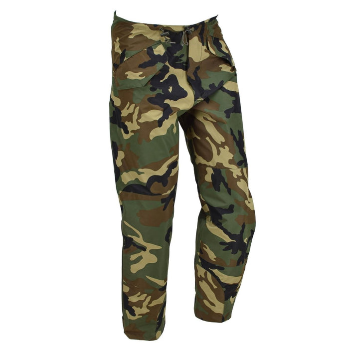 MIL-TEC military style waterproof, windproof cold weather pants with detachable braces in woodland camouflage pattern