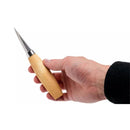 Hand holding MORAKNIV Woodcarving 120 carbon steel knife with wooden ergonomic handle on white background