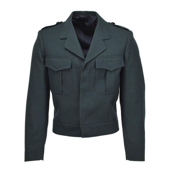 Original belgisk armégrön ullblusjacka med knäppta fickor och hög midja, militäröverskottsstil.