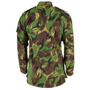 Back view of British Army BDU combat smock jacket in woodland camo with epaulets and adjustable cuffs and waist