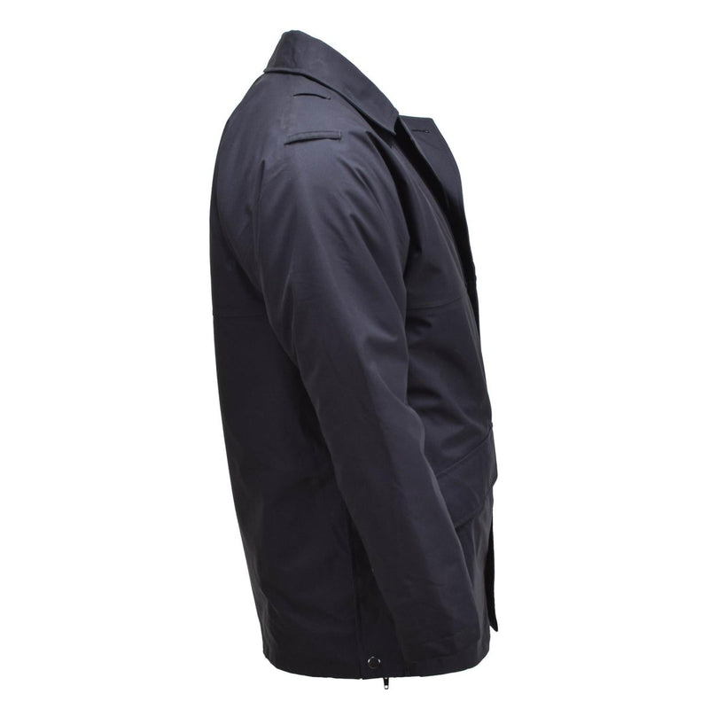 Side view of solid black British military rain jacket with lined waterproof design and multiple pockets