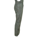 Original Czech Army flame-resistant aramid cargo bib pants in olive green with multiple pockets and reinforced stitching.