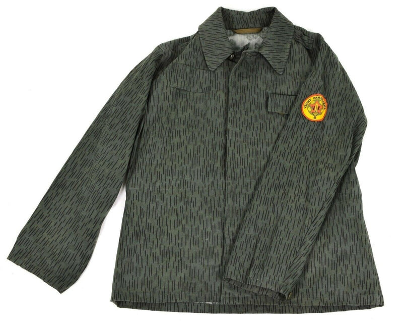 Original Czech army M60 field jacket in raindrop camouflage with military insignia patch on sleeve, vintage parka style