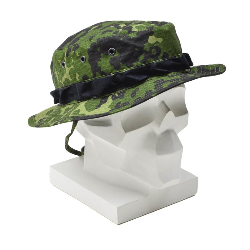 Original Danish M84 camo boonie bucket hat made of durable ripstop fabric with chin strap on white mannequin head