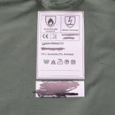 Close-up of olive green original Dutch military fire resistant coverall label with aramid and antistatic fabric details