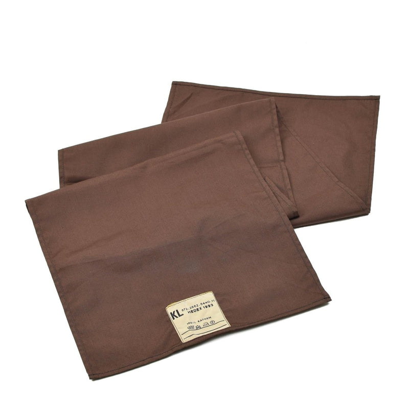 Two brown fabric sheets with a label on a white background