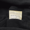 Care label on black polyester lining inside Original Dutch paratrooper winter hat with ear flaps