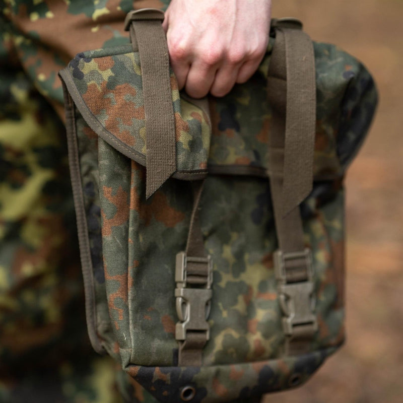 Original German army flecktarn camo combat bag with MOLLE straps, buckles, and durable woodland camouflage design.