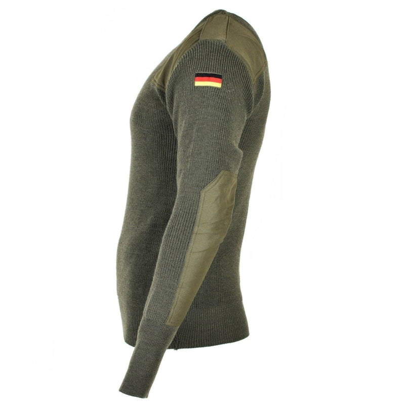 Side view of Original German army green olive wool pullover with reinforced elbows and German flag patch on sleeve