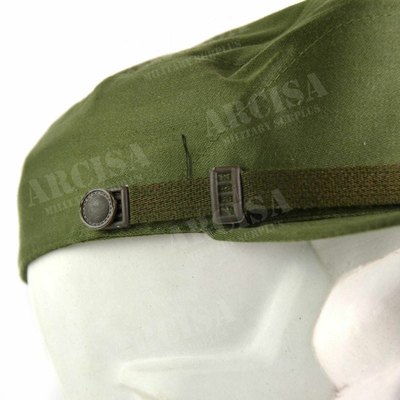 Close-up of olive green Spanish military visor cap with adjustable chin strap on white mannequin head