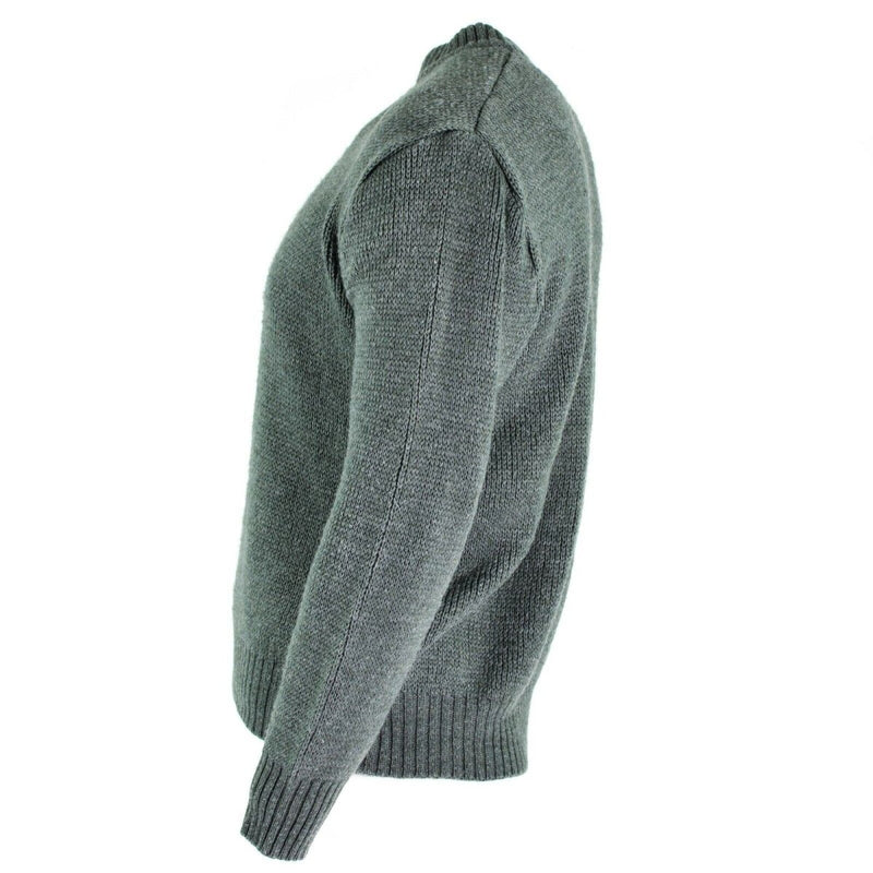 Side view of gray Swiss army M74 pullover jumper made of virgin wool with quarter-zip and ribbed cuffs and waistband