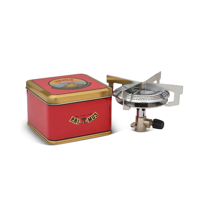 Primus ClassicTrail Stove 130 bred låga campingbrännare med robust design med fyra kapslar och kompakt förvaringsburk i röd metall.