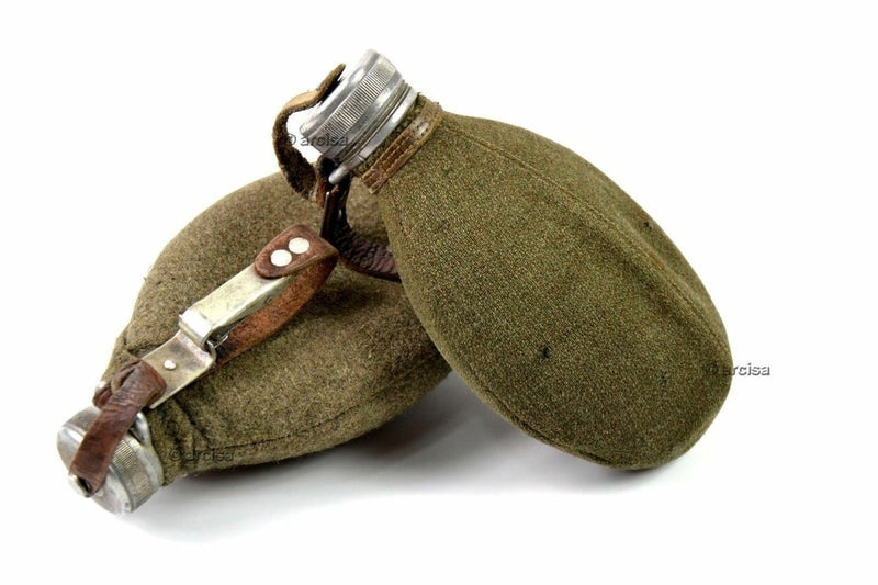 Original WWII Swedish Army metal drinking flask with protective wool pouch and leather strap for carrying.
